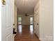 Bright entryway with hardwood floors leading to living room at 4211 Suttle Pl, Matthews, NC 28104