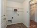 Laundry room with wire shelving and vinyl flooring at 4211 Suttle Pl, Matthews, NC 28104