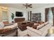 Spacious living room featuring hardwood floors and staged furniture at 4211 Suttle Pl, Matthews, NC 28104