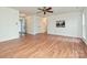 Living room with hardwood floors and access to entryway at 4211 Suttle Pl, Matthews, NC 28104