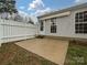 Private patio with a concrete slab and white fence at 4211 Suttle Pl, Matthews, NC 28104