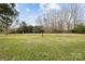 Expansive backyard with a large lawn, perfect for outdoor activities and enjoying nature at 4334 Silo Ln, Charlotte, NC 28226