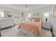 Bright bedroom featuring a large bed, neutral color palette, and stylish decor at 4334 Silo Ln, Charlotte, NC 28226