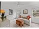 Bright bedroom with neutral tones, decorative pillows, and a large window at 4334 Silo Ln, Charlotte, NC 28226