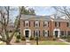 Traditional brick home featuring classic architecture, well-manicured landscaping, and welcoming entrance at 4334 Silo Ln, Charlotte, NC 28226