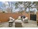 Private outdoor patio with comfortable seating, ideal for relaxing or entertaining guests at 4334 Silo Ln, Charlotte, NC 28226