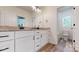 Beautiful bathroom featuring double vanity with granite countertop and tiled shower at 4607 Ferguson Cir, Waxhaw, NC 28173