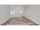 Spacious bedroom with wood-look floors and neutral walls at 4607 Ferguson Cir, Waxhaw, NC 28173