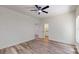 Spacious bedroom with a ceiling fan and wood-look floors at 4607 Ferguson Cir, Waxhaw, NC 28173
