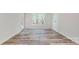 Bright bedroom with wood-look floors and a large window at 4607 Ferguson Cir, Waxhaw, NC 28173