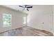 Bright bedroom with a ceiling fan and wood-look floors at 4607 Ferguson Cir, Waxhaw, NC 28173