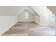 Bright bonus room featuring vaulted ceilings and light wood flooring at 4607 Ferguson Cir, Waxhaw, NC 28173
