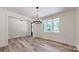 Light and bright dining room features hardwood floors and large windows at 4607 Ferguson Cir, Waxhaw, NC 28173
