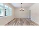 Light and bright dining room features hardwood floors and large windows at 4607 Ferguson Cir, Waxhaw, NC 28173