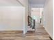 Welcoming foyer with wood floors and a staircase at 4607 Ferguson Cir, Waxhaw, NC 28173