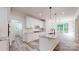 Spacious kitchen with granite countertops, island with sink, stainless steel appliances, and recessed lighting at 4607 Ferguson Cir, Waxhaw, NC 28173