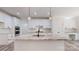 Beautiful kitchen with granite countertops, stainless steel appliances, large island, and custom cabinetry at 4607 Ferguson Cir, Waxhaw, NC 28173