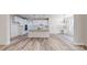 Bright kitchen features white cabinetry, a spacious island, and modern pendant lighting at 4607 Ferguson Cir, Waxhaw, NC 28173