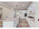 Modern kitchen featuring white cabinets, stainless steel appliances, and a large island at 4607 Ferguson Cir, Waxhaw, NC 28173