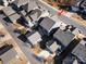 An aerial view of the neighborhood with the home location marked with a red arrow at 5115 Waterloo Dr, Fort Mill, SC 29708