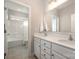 Bathroom featuring double sinks with quartz countertops, tub, and shower at 5115 Waterloo Dr, Fort Mill, SC 29708