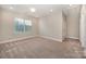 Empty bedroom with carpeted floors, neutral walls, and natural light at 5115 Waterloo Dr, Fort Mill, SC 29708