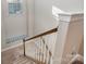 Carpeted staircase with white banisters leading to the upper level at 5115 Waterloo Dr, Fort Mill, SC 29708