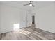 Spacious bedroom with wood-look floors and access to other rooms at 529 Ambassador St, Charlotte, NC 28208