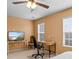 Bedroom with home office setup and ceiling fan at 5636 Whitehawk Hill Rd, Mint Hill, NC 28227