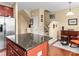 Kitchen island with granite top and breakfast bar, offering extra counter space at 5636 Whitehawk Hill Rd, Mint Hill, NC 28227