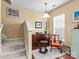 Cozy sitting area with comfortable chair and built-in shelving at 5636 Whitehawk Hill Rd, Mint Hill, NC 28227