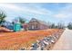 Newly built house on a lot with cleared land and rock wall at 604 E Ridge St, Kings Mountain, NC 28086