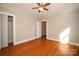 Hardwood floor bedroom with ceiling fan and closet at 617 York S Ave, Rock Hill, SC 29730