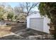 Detached garage with roll-up door and concrete pad at 617 York S Ave, Rock Hill, SC 29730