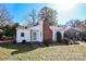 Front view of a cozy white house with brick accents at 617 York S Ave, Rock Hill, SC 29730