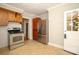 Bright kitchen with wood cabinets, stainless steel appliances, and tiled floor at 617 York S Ave, Rock Hill, SC 29730