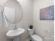 Powder room with pedestal sink and toilet at 642 Citriadora St, Fort Mill, SC 29715