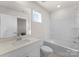 Full bathroom with a bathtub, toilet and single vanity at 642 Citriadora St, Fort Mill, SC 29715