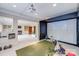 Finished basement with golf simulator and entertainment area at 7213 Fairway Vista Dr, Charlotte, NC 28226