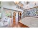 Grand entryway with hardwood floors and view of living room at 7213 Fairway Vista Dr, Charlotte, NC 28226