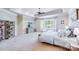 Spacious main bedroom with large windows and built-in shelving at 7213 Fairway Vista Dr, Charlotte, NC 28226