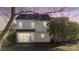 Exterior back of home features an enclosed porch, vinyl siding and a dark roof at 9635 Veronica Dr, Charlotte, NC 28215