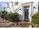 Close-up of the home's front door entrance showcasing the well-maintained landscaping at 9635 Veronica Dr, Charlotte, NC 28215