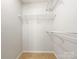 Bright walk-in closet with wire shelving at 10306 Creswell Ct, Charlotte, NC 28215