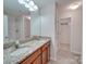 Bathroom with granite countertop and double vanity at 1033 Cedar Village Trl, Salisbury, NC 28147