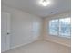 Spacious bedroom with window and neutral walls at 1033 Cedar Village Trl, Salisbury, NC 28147