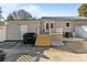 View of backyard with deck and storage building at 120 Moyle Ave, Salisbury, NC 28146