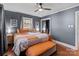 Bedroom with a large bed, ceiling fan, and ample closet space at 120 Moyle Ave, Salisbury, NC 28146