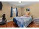 Bedroom with a bed, desk, and a large stuffed bunny at 120 Moyle Ave, Salisbury, NC 28146