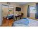 Bedroom with mirrored closet doors and hardwood floors at 120 Moyle Ave, Salisbury, NC 28146